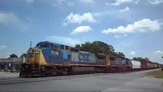 CSX Long Mixed Freight Train Through The Middle Of Folkston GA