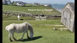 Wind and sun on the ridge overlooking Rhossili beach and slow TV moments of sand and waves