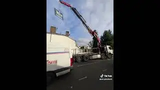 Facade wall glass installation with Tower Crane