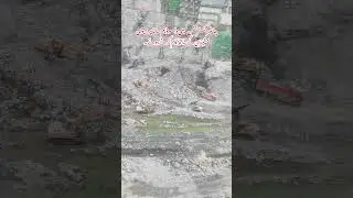 Chinese construction company is working with heavy machinery on the DASU dam site.
