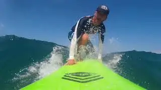 pop up on a surfboard slow motion