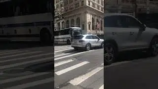 Unmarked Porsche with rumbler siren responding in NYC