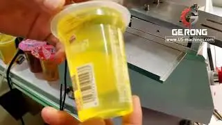 Semi automatic cone shape jelly cup drink cup labeling machine labeler equipment