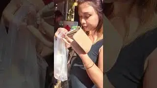 Beautiful Thai girl try village food