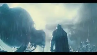 Batman shows off his Bat-symbol