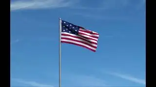 13 Star US Flag Flying in the Wind