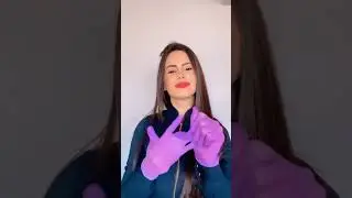 Cute girl in purple gloves