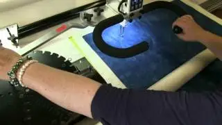 Quilting circles on the longarm machine using the circlemaker, by Linzi Upton