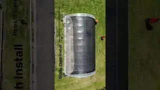 Shade cloth installation to help reduce temperatures inside the hoop house.