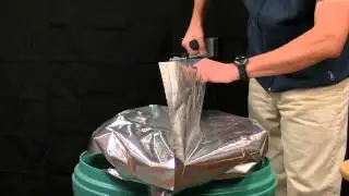 Doboy HS-BII Rotary Sealer Sealing 5-mil Drum Liner - Handheld