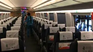 Cleaning Team turning seats Round on Bullet Train, China