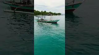 Tiny Boat, Endless Ocean &ndash; Fishermen Crossing Crystal Clear Sea Between Islands #islandparadise
