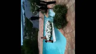 FLOATING FLOWER POOL ARRANGEMENT -   RHEANNON LEE FLORAL DESIGNS
