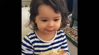 Cute little baby eating Avocado Sandwich for the very first time!