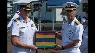 Admiral John Richardson presents the crew of HMNZS Te Kaha with a Meritorious Unit Citation