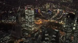 Night aerial view of Frankfurt skyline with illuminated skyscrapers like Opernturm UBS tower