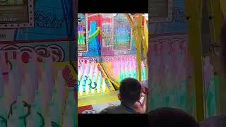 Kids play at arcade games