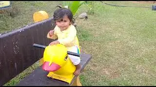 Small done play with his bike