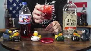 Paul Campilii - Wiched Dolphin Mango Rum & Fanta Chucky's Punch