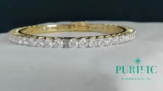 The single line diamond bangle is elegant.