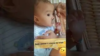 Baby Veranique's first solid food