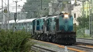 Cholan Express with an unexpected 2 engines heads towards Chennai Egmore.