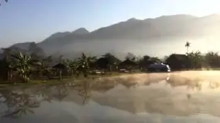 Misty lake mountains Pai Thailand