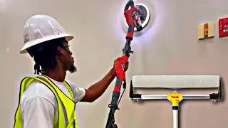 Imperial Painter sanding w/ Bauer 9&rdquo; radius drywall sander & rolling wall w/ Purdy 18&rdquo; system