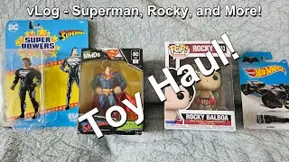 vLog - Black Suit Superman Super Powers Action Figure, Rocky Balboa Funko Pop, Hot Wheels, and More!