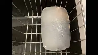 WWE figure frozen in ice melting time-lapse 