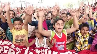 Anganwadi workers children also join protest demanding regularization and wage hike
