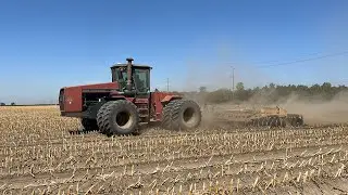 Case IH Steiger 9270 tractor pulling disc harrow on dry soil in California
