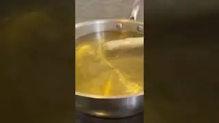 Pan Frying Lumpiang Gulay(Vegetables Spring Rolls) hot oil and then turn the heat down to medium low
