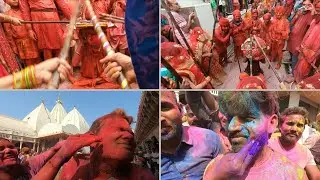 Stick em' up! Indian women 'beat' men during Holi festival | AFP