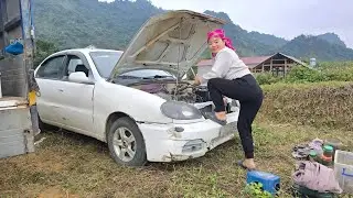 The girl repairs and restores a broken car for her neighbor.