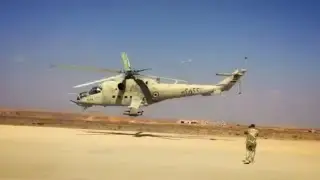 Mi-24 hind of the Syrian Air Force at a very low level flying.