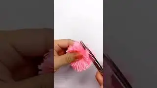 accesories ruang tamu membuat bunga dari benang wol dan kertas minyak.