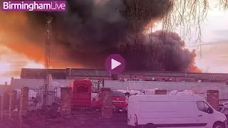 Firefighters tackle factory blaze as thick smoke makes it 'hard to breathe'
