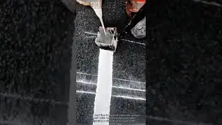 Road marking work with manual painting tool precision