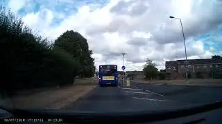 Van Overtakes Swindon Bus on a Keep Left Bollard on Liden Drive Swindon