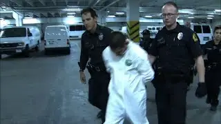 Home Depot Shooting Suspect Escorted to Jail