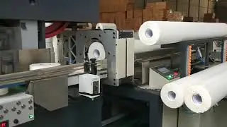 Jumbo roll bath tissue paper cutting machine
