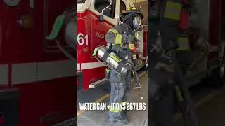 Michelle Wears Fire Fighting Gear