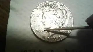 1934-D Peace Dollar with a double-die obverse