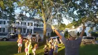 Giant bubble making in Natick Common