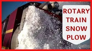 Train snowblower plows the railways after snow storm  - Train Snow Plow - Rotary Snow Plow Blower