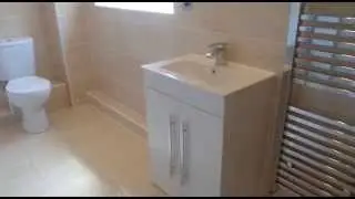 An ensuite refitted which included both a bath and shower.