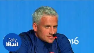 Swimmer Ryan Lochte supports U.S. flag bearer Michael Phelps - Daily Mail