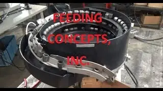 VIBRATORY BOWL PARTS FEEDER SATISFYING ROBOT- Feeding Concepts, Inc.