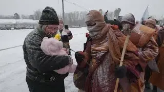 Thousands wait hours to see Buddhist monks' peace walk through Petersburg: 'You can see the love'